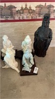 5 oriental statues