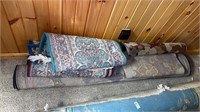Lot of rugs and carpets of various sizes
