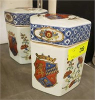 PAIR OF LION CREST COVERED CANISTERS