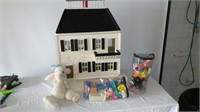 Wooden doll house & assorted home furnishings