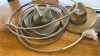 Vintage cowboy hats and lasso conditions as shown