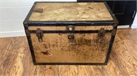 Old trunk measuring 36x21x25. Latches work.