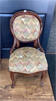 Upholstered sitting chair, project chair.