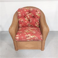 Wicker tub chair w/ floral cushions