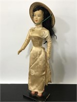 Asian inspired figurine with traditional dress
