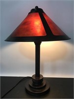 Brown metal industrial style lamp - powers on
