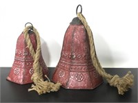Pair of red metal outdoor hanging bells