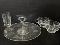 Set of glass tea dishware with etched floral
