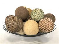 Decorative metal bowl of decorative balls