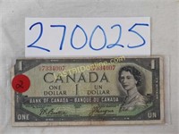 Rare 1954 Canadian $1 "Devil's Face" in hair