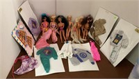 E4)  Dolls: Barbies + Barbie Clothes