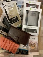A lot of sorted cell phone cases and accessories