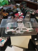 Number 88 diecast race car Mountain Dew in