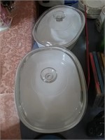 Group of two oval Corning casserole dishes with