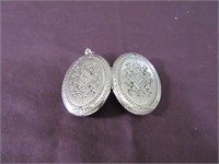 Silver Locket Holds 2 Pictures