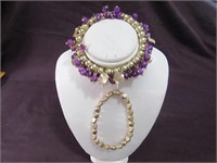 2 Elastic Bracelets 1 Purple / Gold, 1 Gold