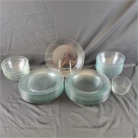 21 Glass Dinner Plates, and 8 glass bowls