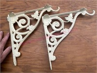 Pair of ornate iron shelf brackets