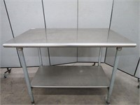 APPROX. 4' S/S 2 TIER WORK COUNTER ON WHEELS