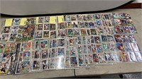 OVER 300 NFL TRADING CARDS IN SLEEVES