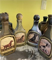 Set of four Beam’s Choice Dog themed decanters.