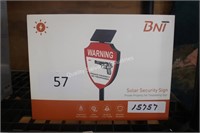 solar security sign