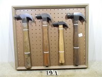 Peg-framed display of 4 – vintage claw hammers, G