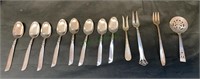 Lot includes two sterling silver cocktail forks,