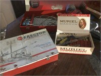 Two erector set boxes, includes pieces and a motor