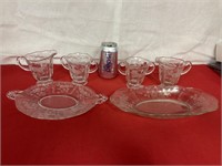 Two etched glass cream & sugar sets