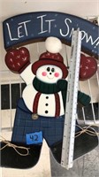 Wooden let it snow sign