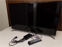 Samsung TV, with remote, 31"