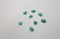 Parcel of 8 loose oval cut Emeralds weighing
