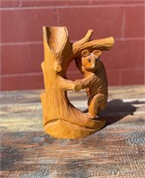 Hand carving of wood black forest bear in a tree m