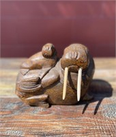 Cow and calf soapstone walrus with ivory tusks, 9.