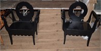 2 black lacquered modern arm chairs
