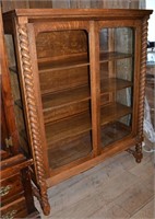 Oak 2 door china cabinet with barley twist columns