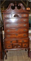 Mahogany Chippendale style high boy with shell can