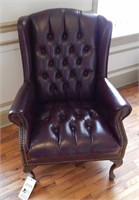 High back brown leather chair