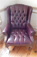 High back brown leather chair