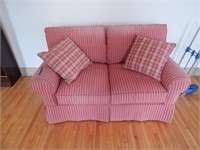 Red striped loveseat