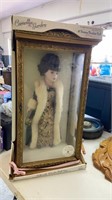 16” genuine porcelain Doll in glass casing