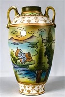 Heavily enameled hand painted vase