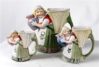 Set of German character pitchers