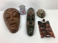 4 masques africains en bois polychromé
