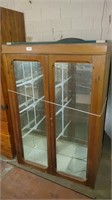 wooden display case with glass shelves