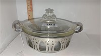 clear pyrex with silver casserole trivet
