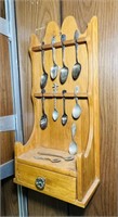 Old Spoons on a Wooden Spoon Rack