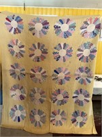 Full-size hand stitched quilt