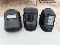 3 assorted welding helmets
